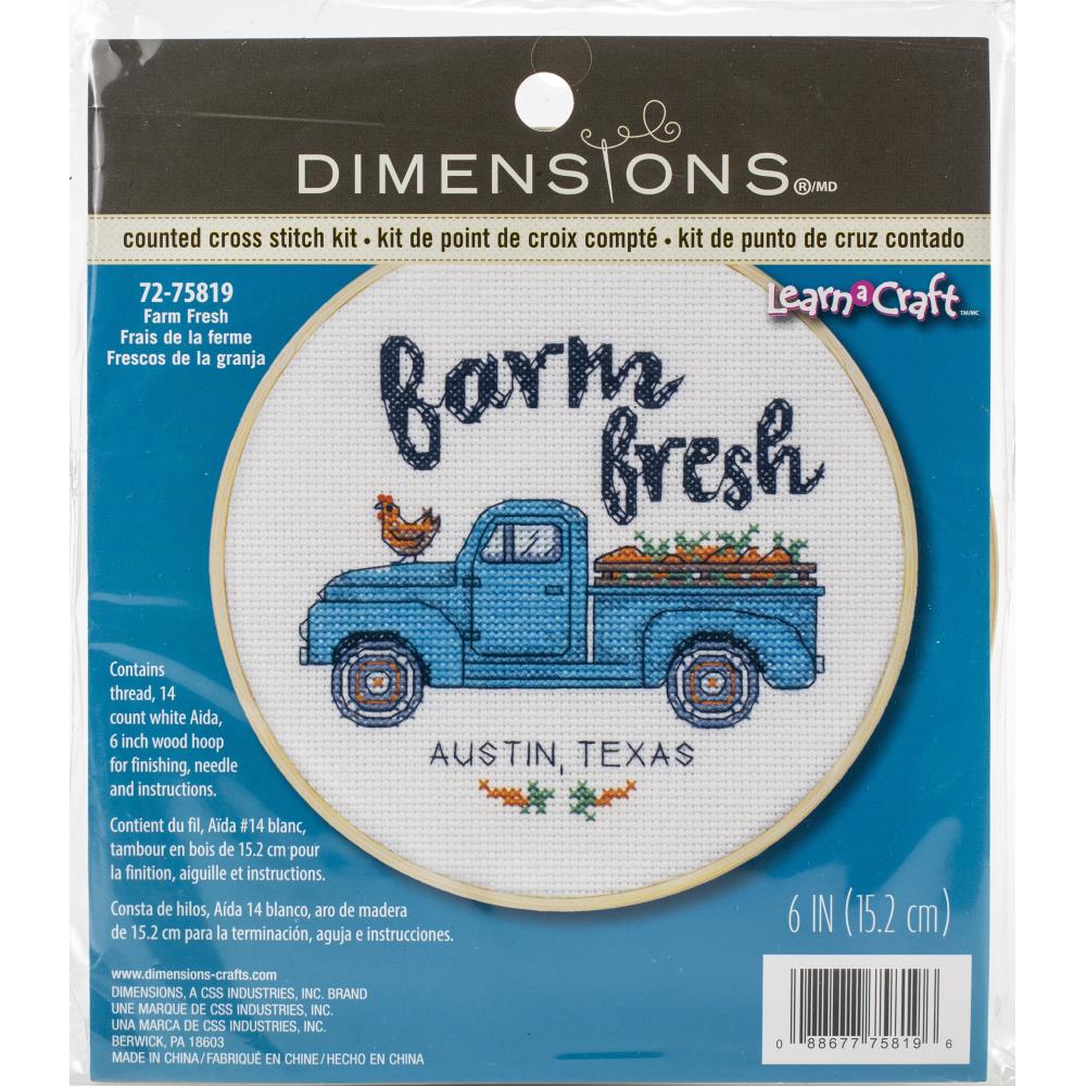 Dimensions by Learn Craft Farm Fresh counted cross stitch kit in its retail packaging, featuring a blue vintage pickup truck with flowers and the words 'Austin, Texas' stitched on a white fabric circle.